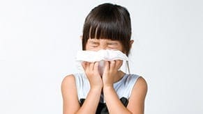 Indoor Air Quality Child suffering from allergies due to poor indoor air quality