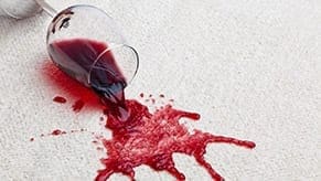 Red wine stain on carpet. Red wine stains require professional carpet cleaning service